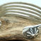 Five Bar Sterling Cuff with Fluted Repousse Button Terminals, Jewelry by John Begay
