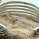 Five Bar Sterling Cuff with Fluted Repousse Button Terminals, Jewelry by John Begay
