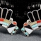 Rainbow Man Pendant Earrings, Jewelry by Quinton & Margie Quam