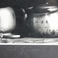 Metal Teapots on Shelves, Some Battered from Use, Photography by Errol  Zimmerman