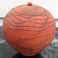Spherical Orange Statement in Clay, Pottery by Nick Bernard