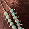 Sterling silver squash blossom necklace with multi-stone sunface inlay, Jewelry by Frank  Vacit