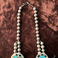 Sterling silver squash blossom necklace with multi-stone sunface inlay, Jewelry by Frank  Vacit