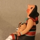 Storyteller with Two Children, One Soccer Ball, Pottery by Diane Lucero
