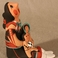 Storyteller with Two Children, One Soccer Ball, Pottery by Diane Lucero